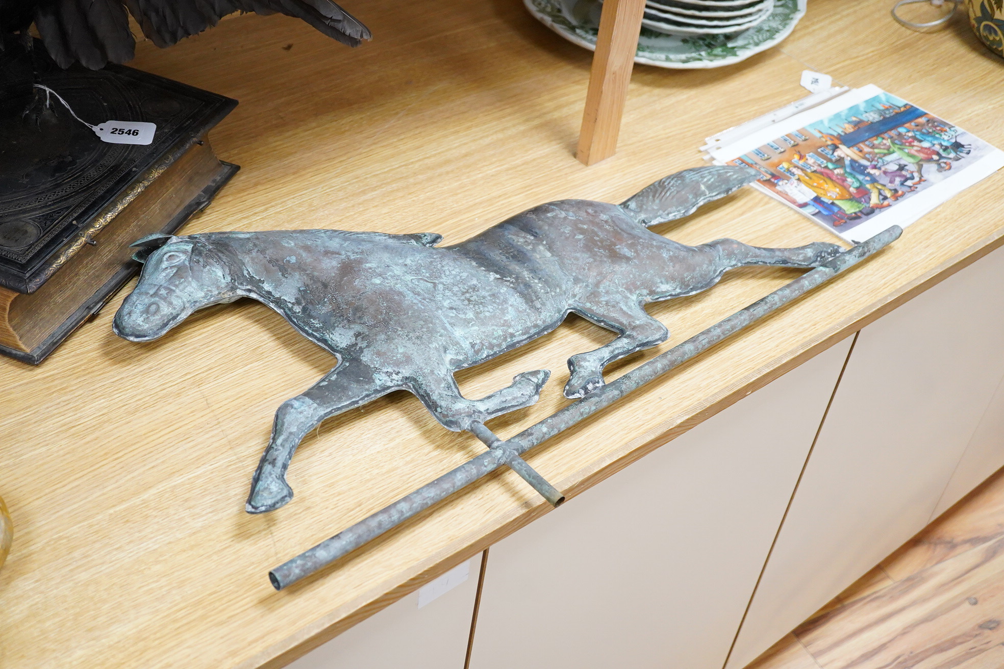 A copper ‘horse’ weather vane, 71cm wide.